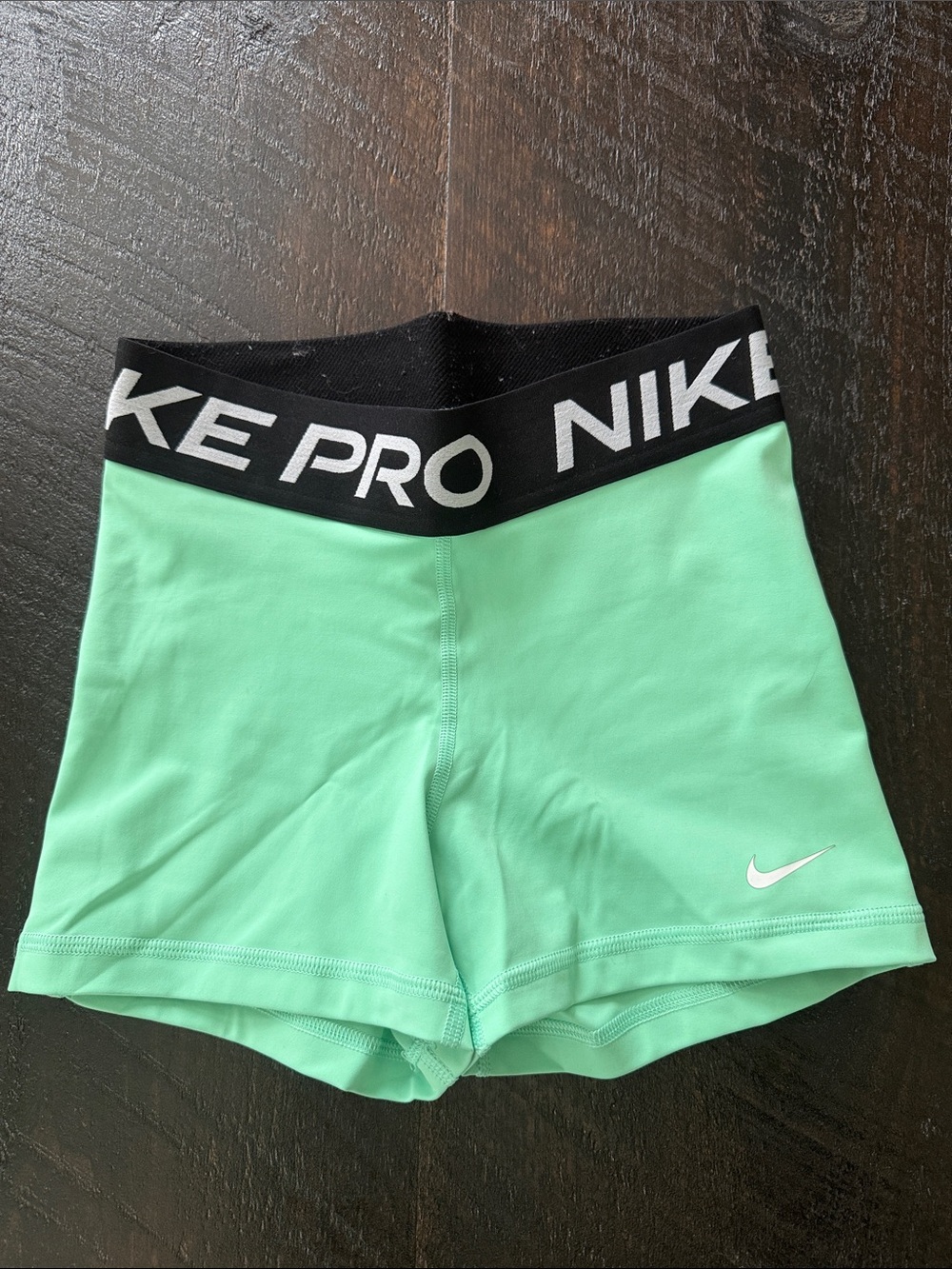 Nike Women's Mint Green Athletic Bike Shorts with Black Logo Waistband